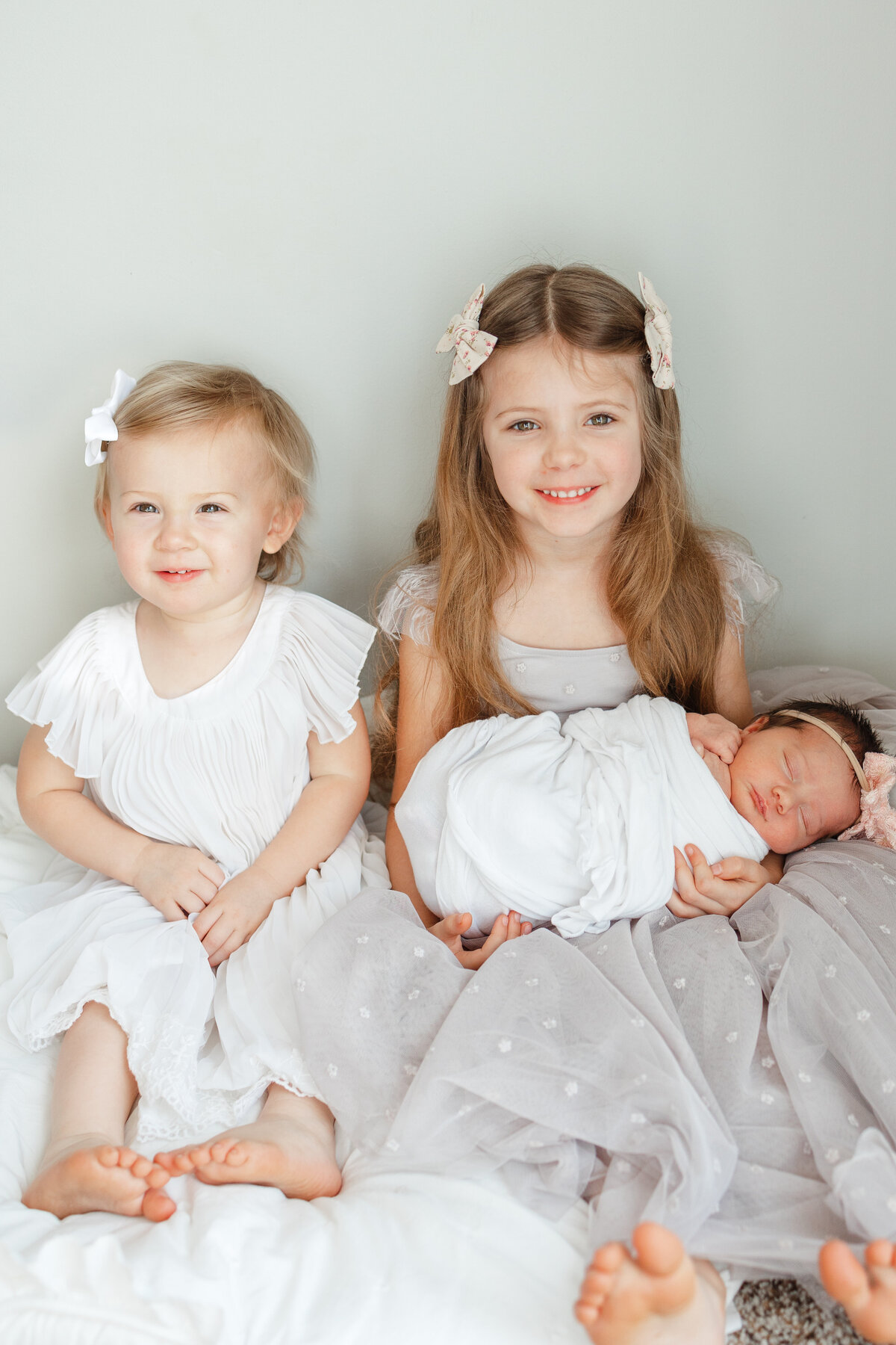3-sisters-during-newborn-photos-in-virginia-beach