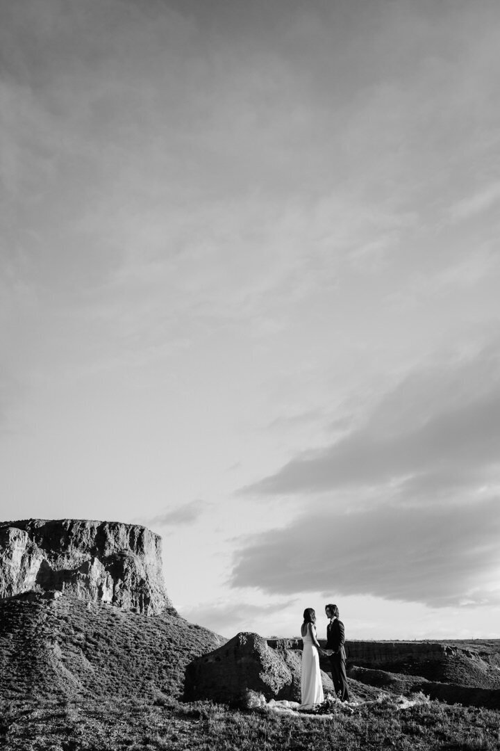 The Lovers Elopement Co - bride and groom wedding ceremony on top of mountain in Queenstown, South island of New Zealand