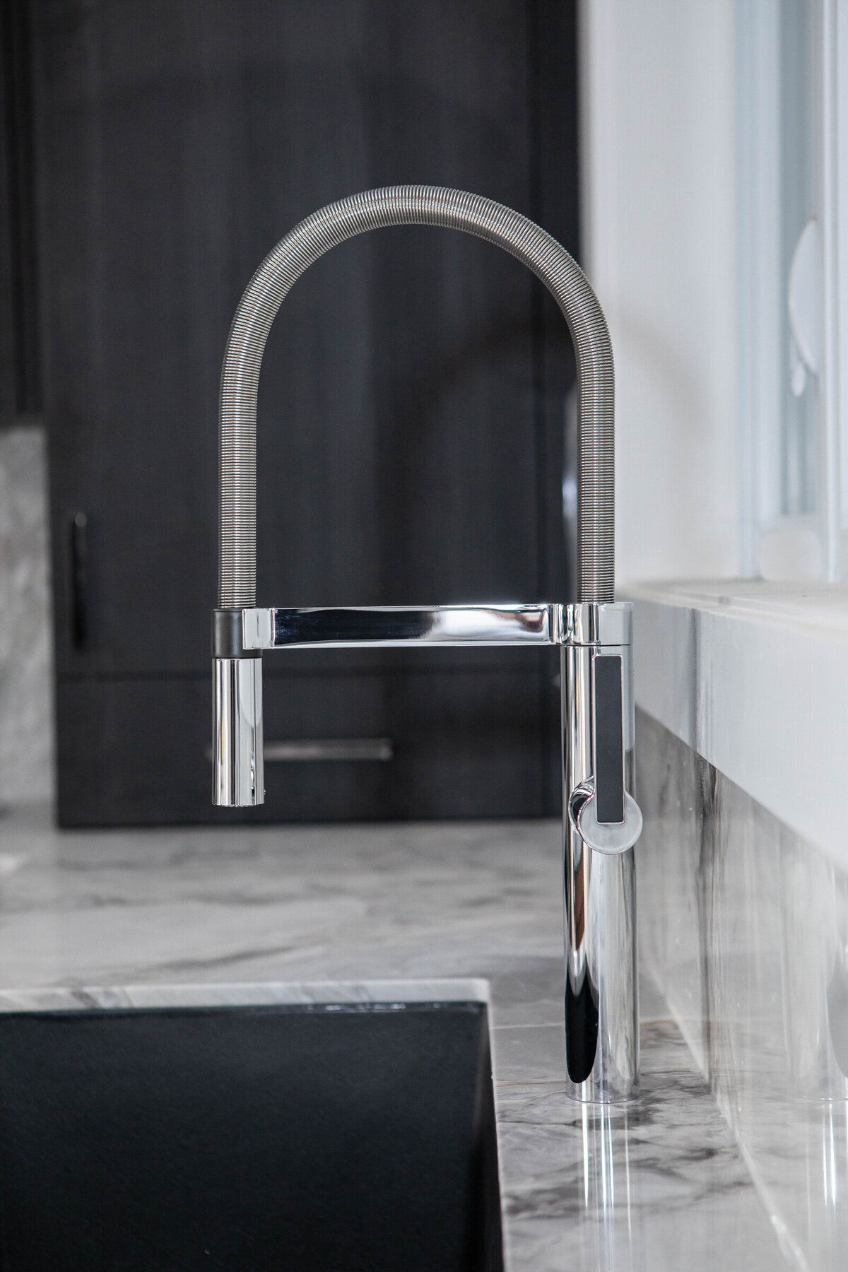 modern-chrome-and-black-kitchen-sink