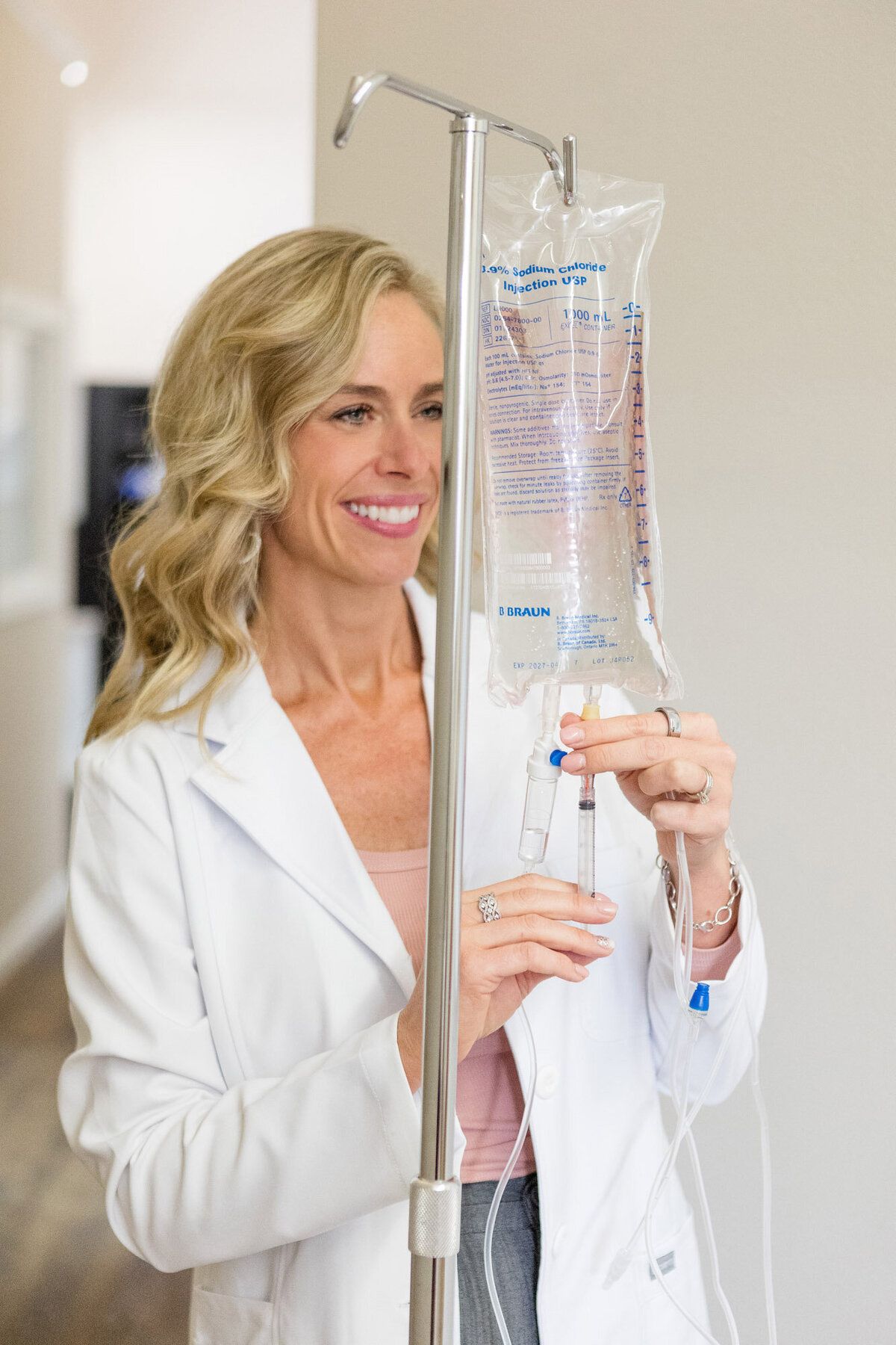 Jamie holding an IV bag