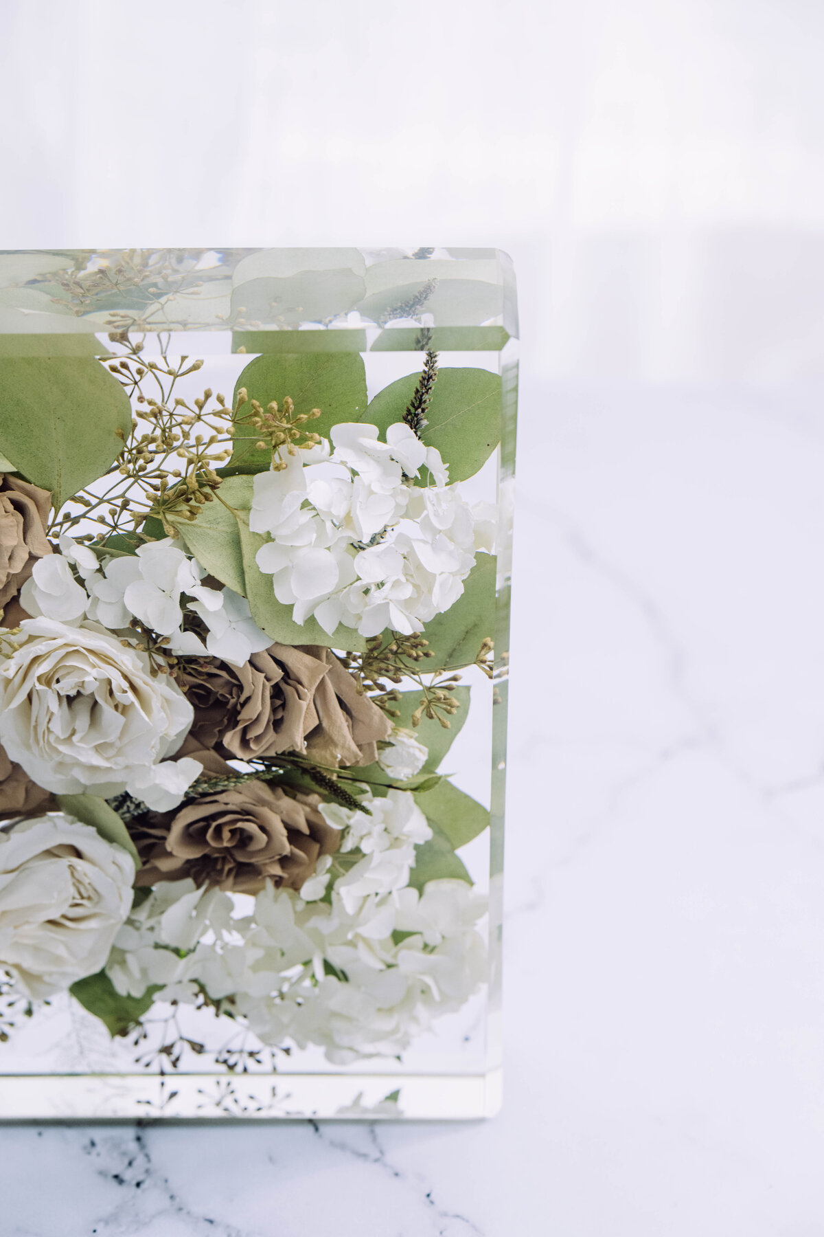hydrangea and rose bouquet encapsulated in resin