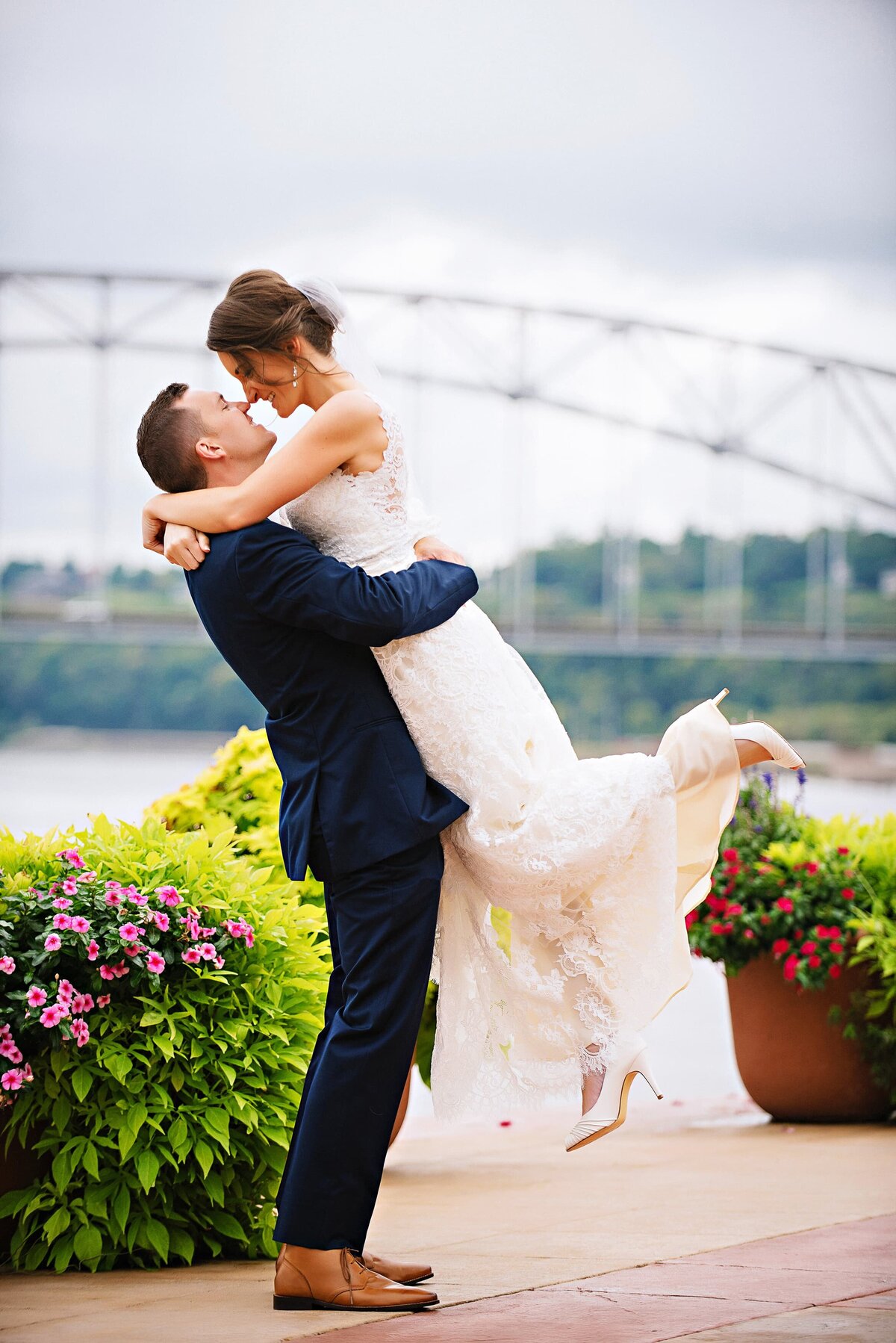 Wedding couple at Grandriver with Dubuque bridge in background