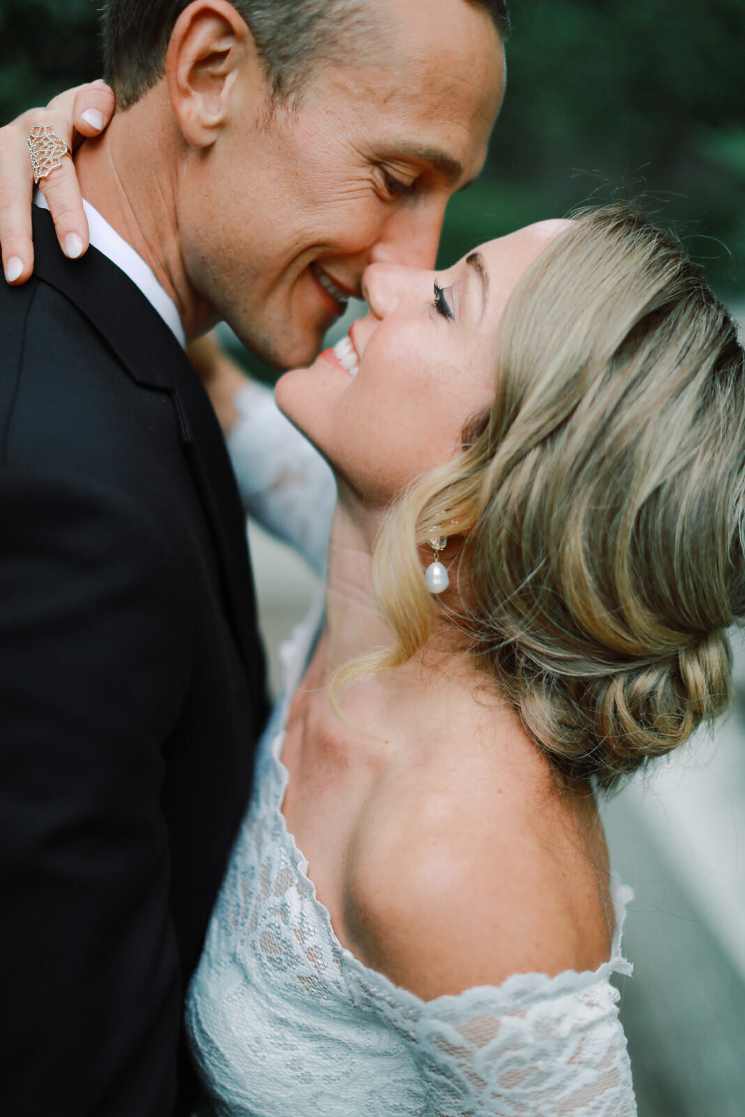 A fine art film wedding photographer captures a modern couple on their wedding day at Proximity Hotel in Greensboro.