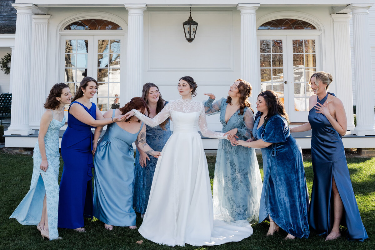 A Bride and her bridal party creative photograph.