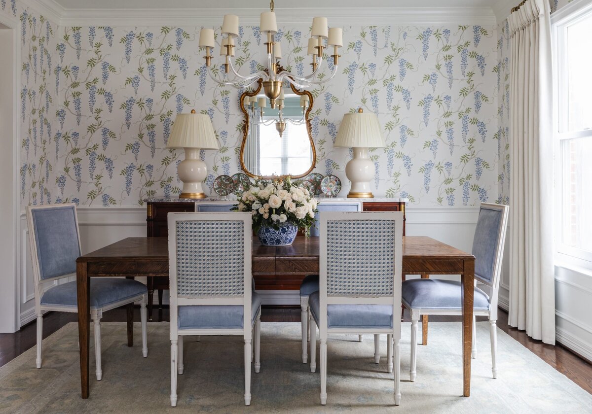 vision and hammer dining room with wallpaper and wooden table with light blue chairs