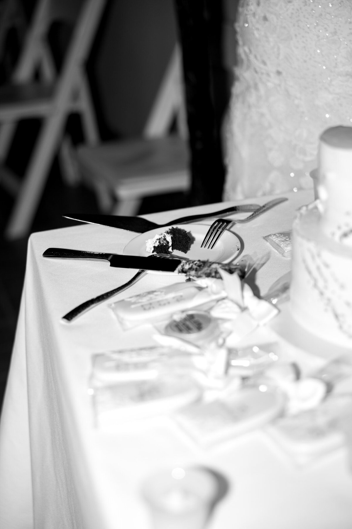 Detail of cake cutting during reception at Hilton Beachfront Resort Santa Barbara