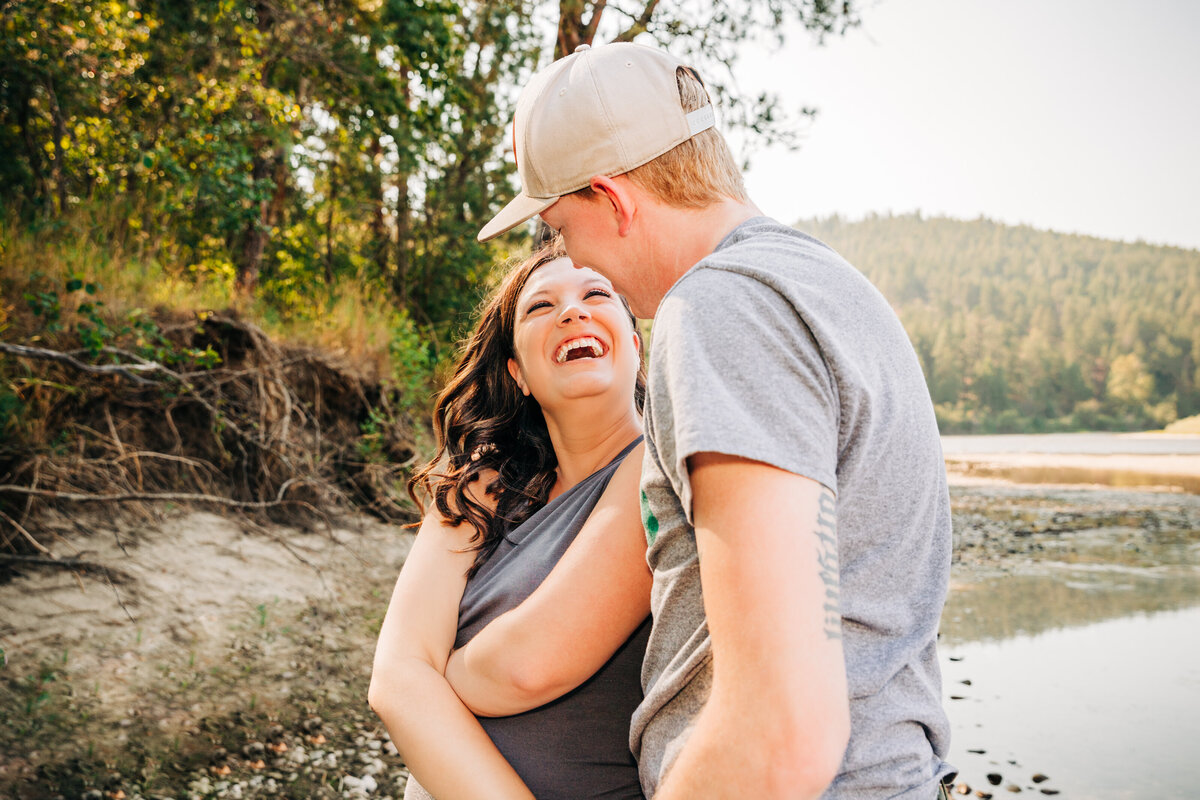 Engaged couple dancing at Maclay Flat in Missoula, MT