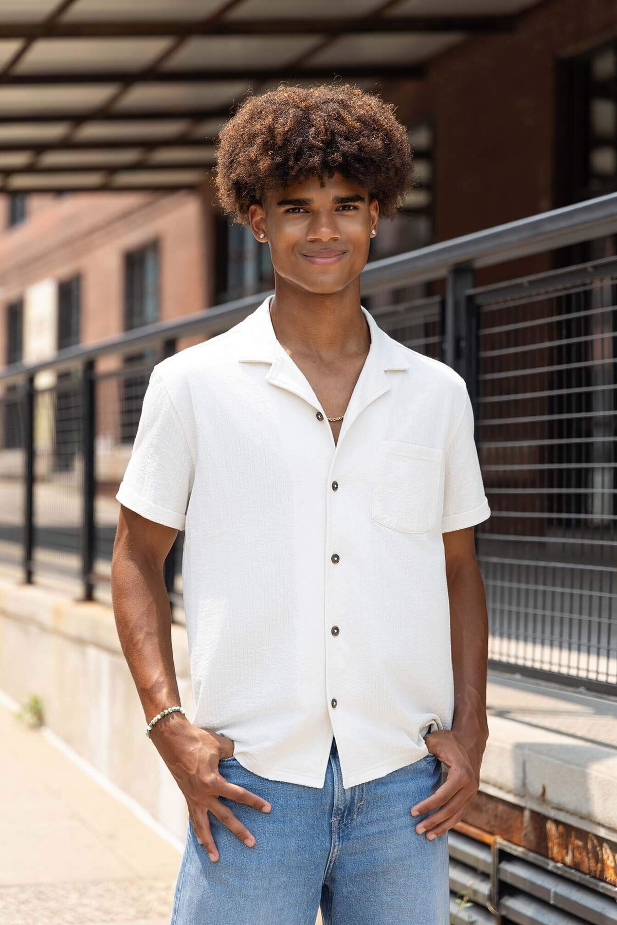 senior-guy-smiling-in-urban-location