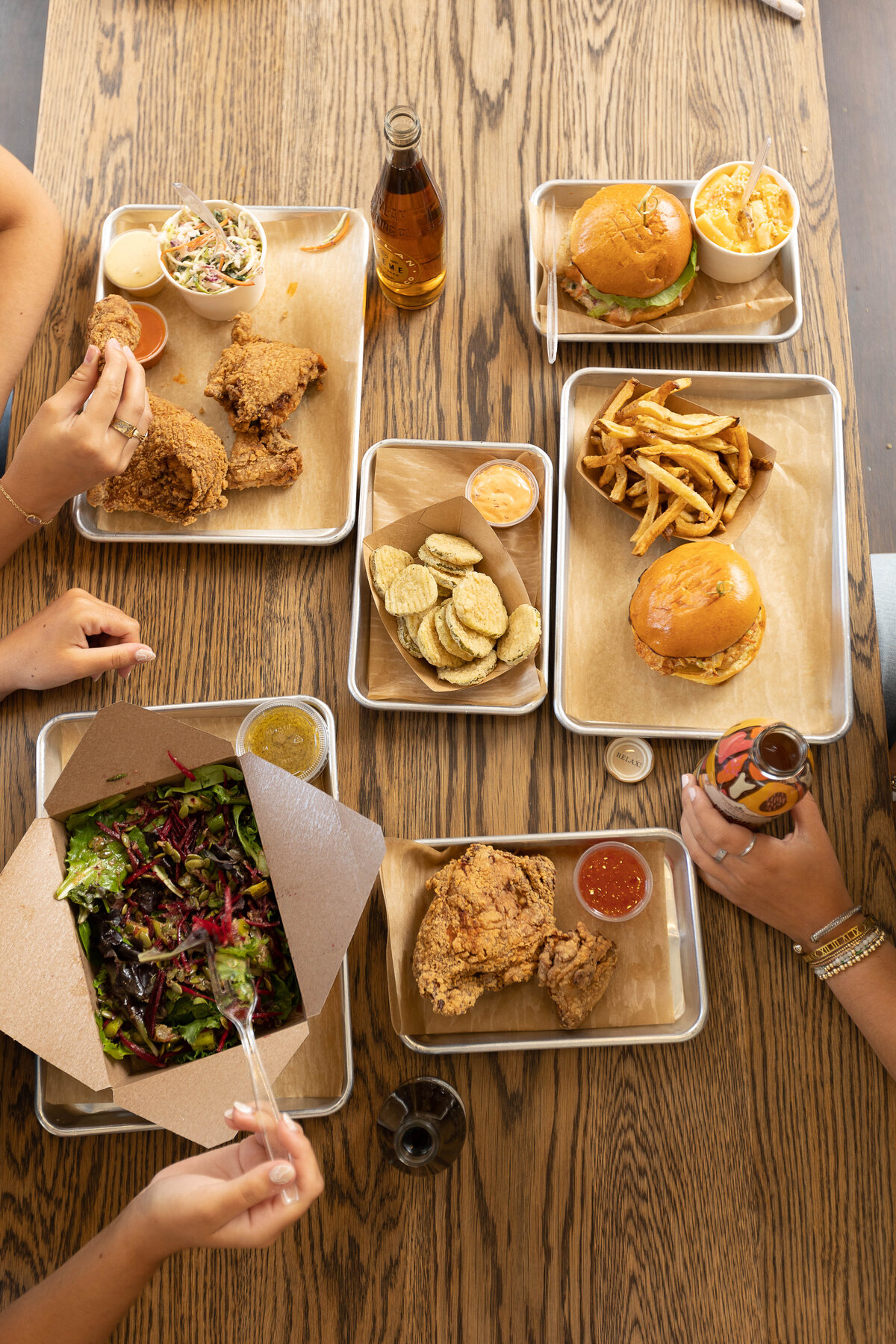 Overhead shot of casual food on wooden table