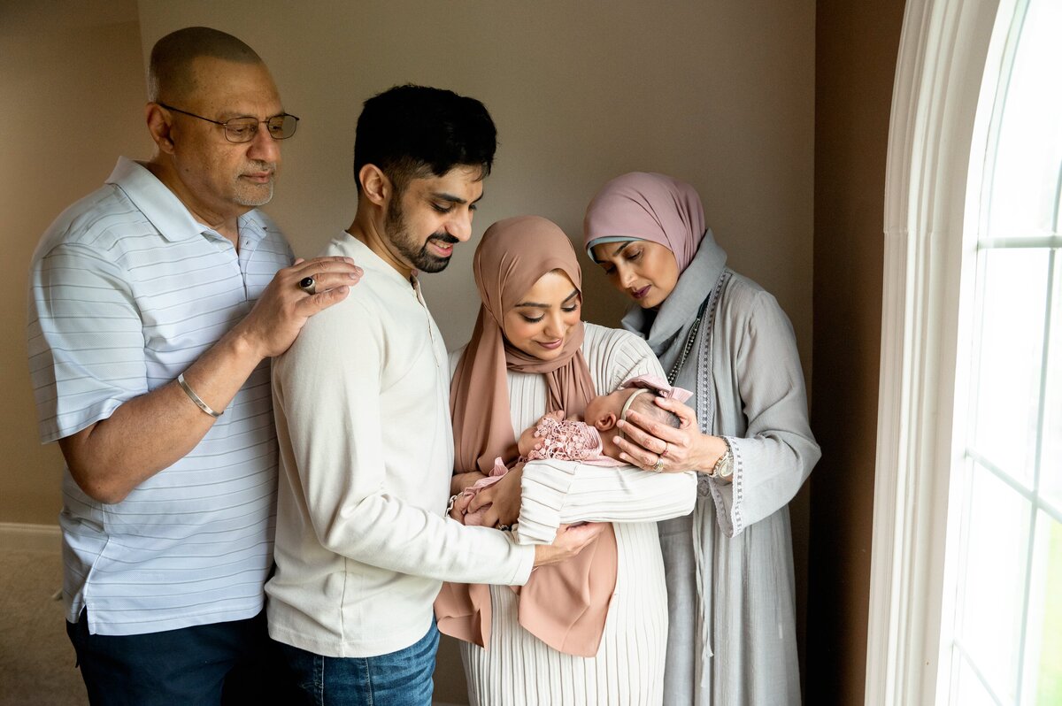 grandparents and newborn family