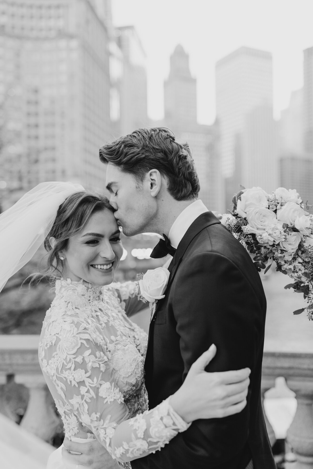 Bride and groom sharing a tender moment during their wedding reception in South Bend.