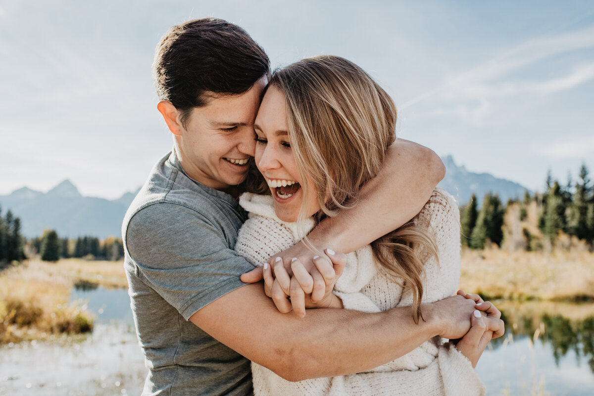 Photographers Jackson Hole capture couple laughing together