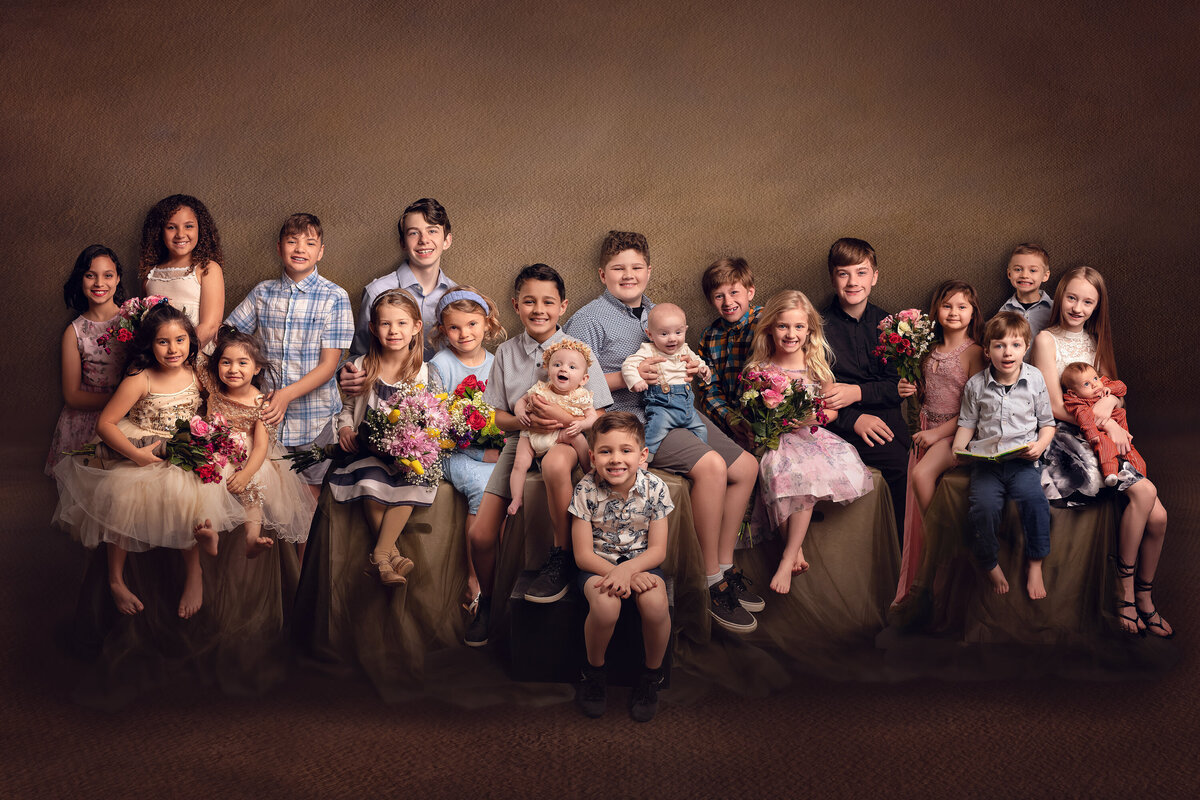 Twenty cousins gather in our Waukesha portrait studio for the ultimate extended family photo!