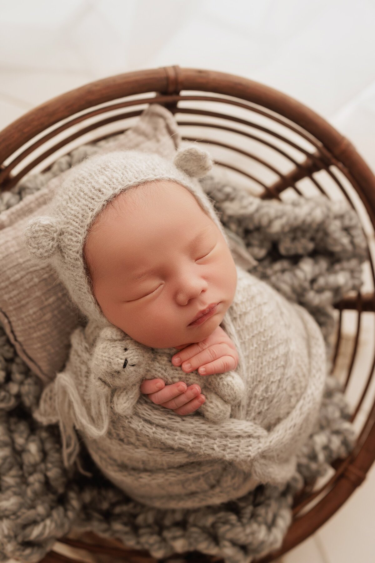 Beautiful newborn portraits in Elk Grove and Sacramento, capturing your baby's precious moments with simple elegance. Book your session today