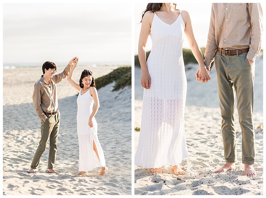 couple holding hands and twirliing in sand dunes