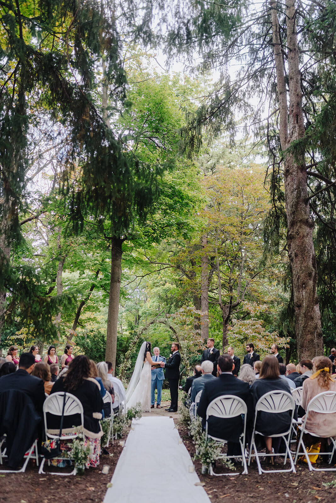 wedding ceremony in a forest at Finger Lakes wedding, NY