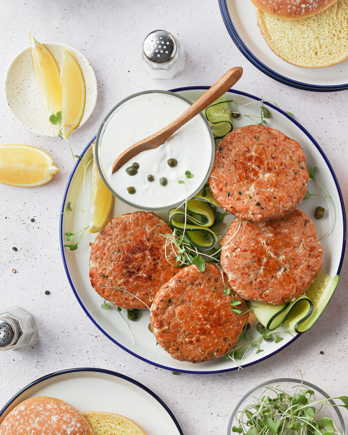 a plate with burger patties on it