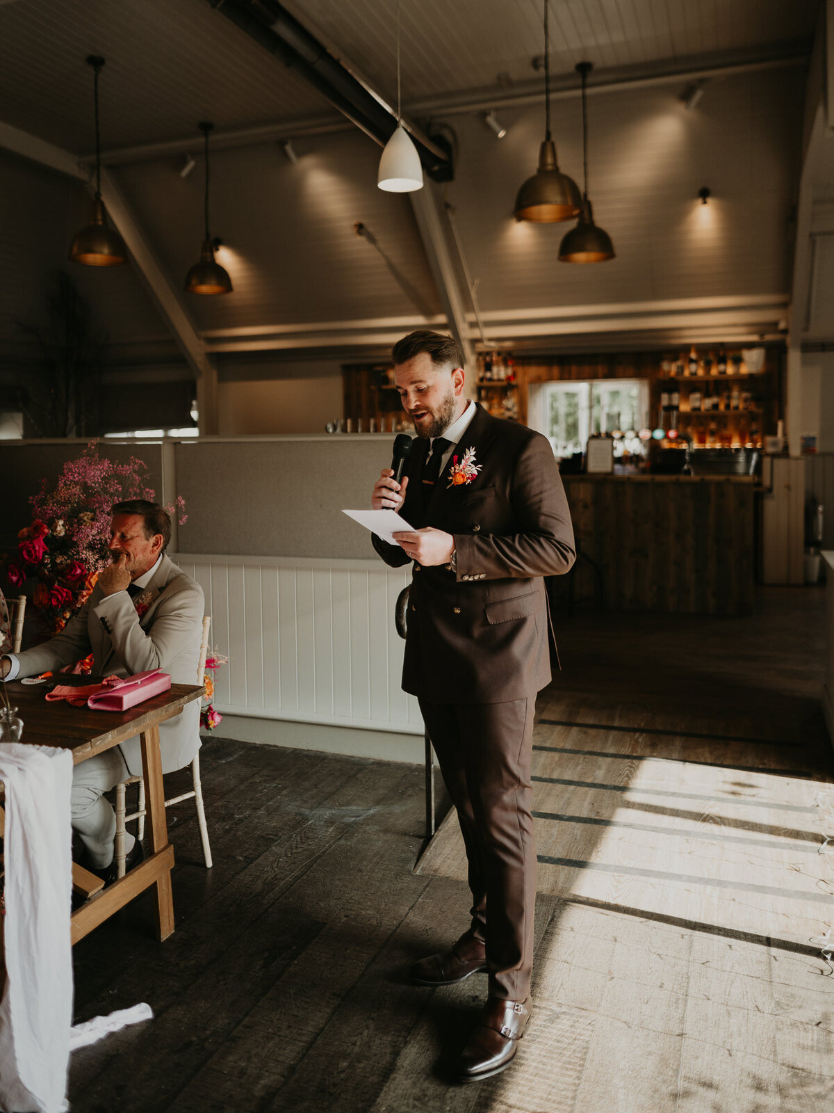 Groom delivers his speech at Lapstone Barn. 