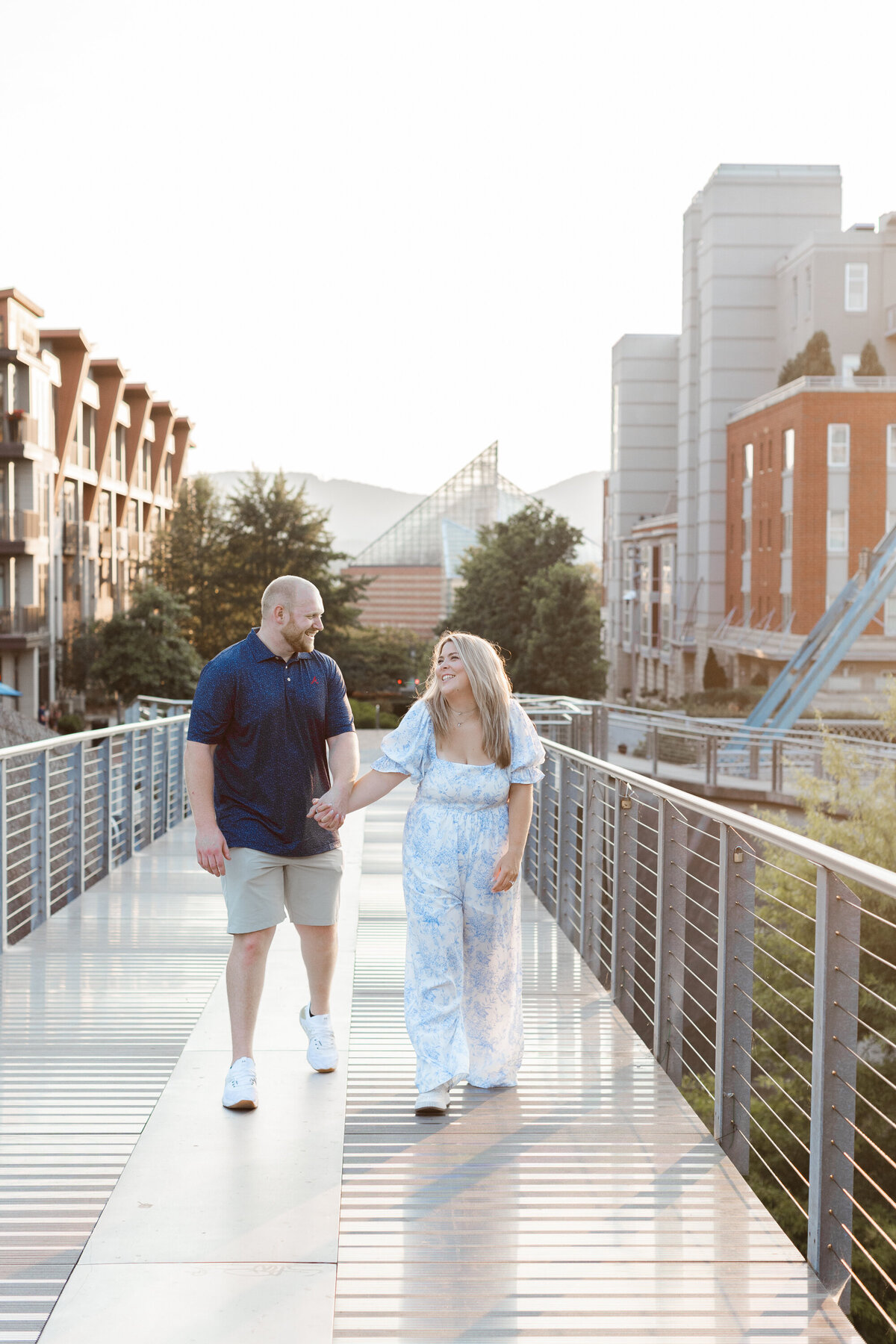 proposal session walking across the bridge in downtown Chattanooga