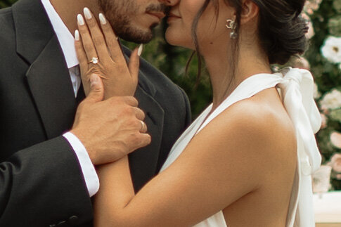 Luxury Florida wedding surrounded by tall palm trees and tropical details at The Palm Mansion in Umatilla