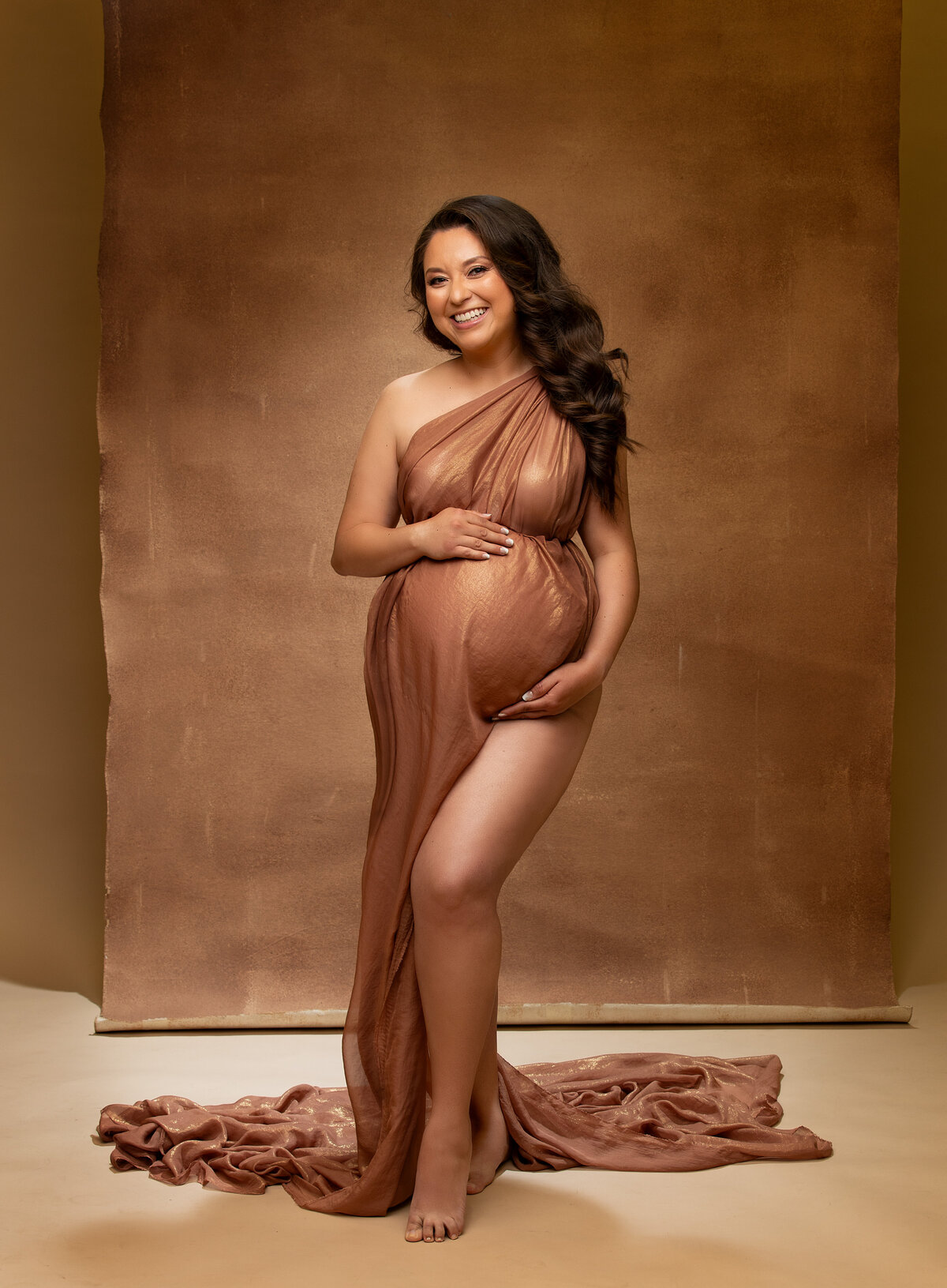 Cherish your pregnancy with timeless maternity photography in a comfortable and professional studio environment.