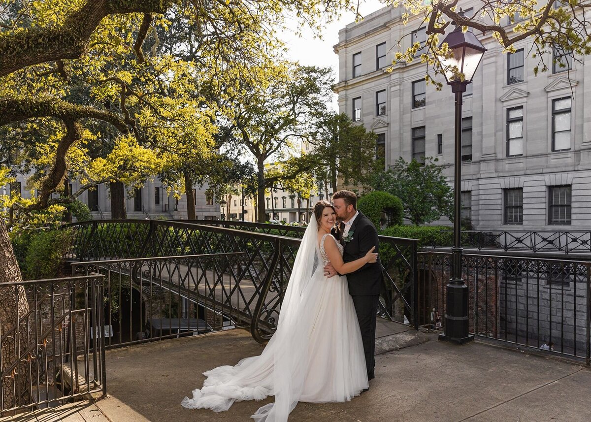 Groom-Bride-infront-Bridge-Vic's-On-The-River-Savanah