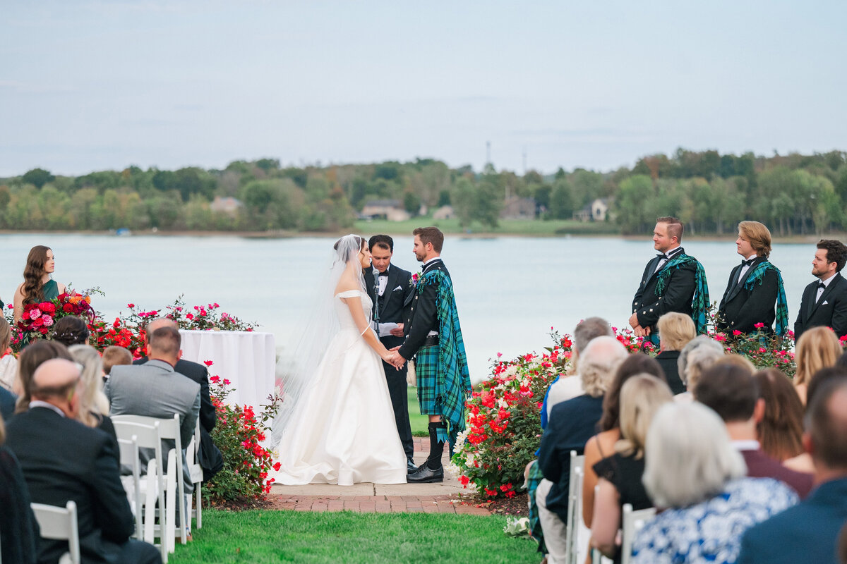 wedding ceremony in the center of the rose garden at The Lake Club Ohio