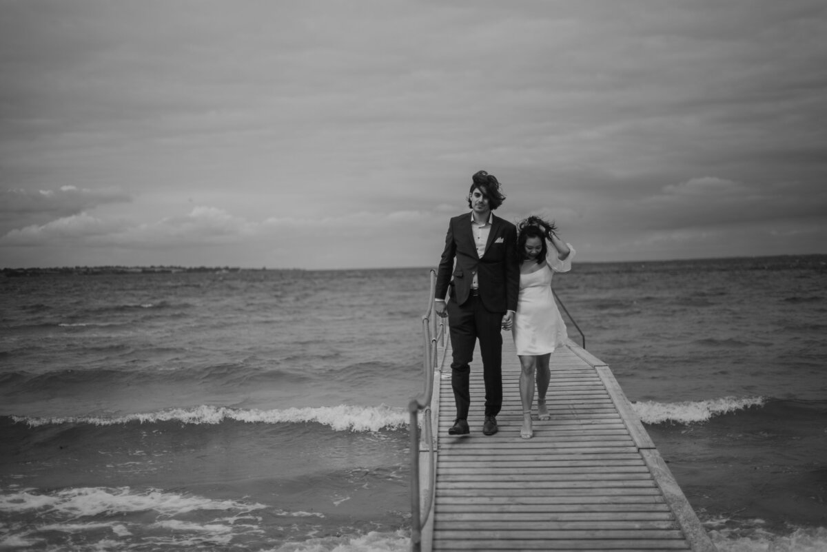 Couple at the sea on a dock
