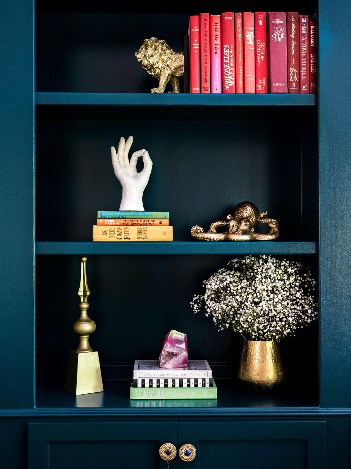 sweet southern home merry maximalism teal shelves with sculptures and books