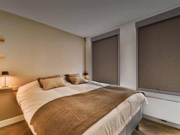 Blackout roller shades in a Las Vegas bedroom