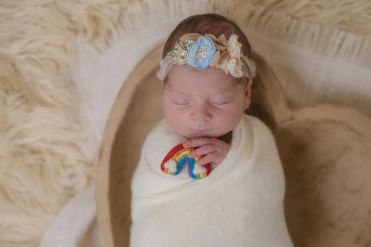 rainbow baby in a heart bowl