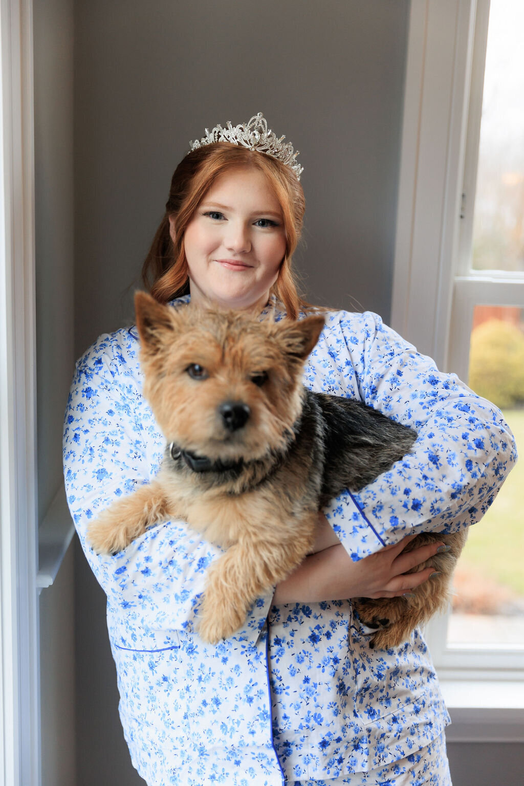 Sweet 16 girl holding her dog
