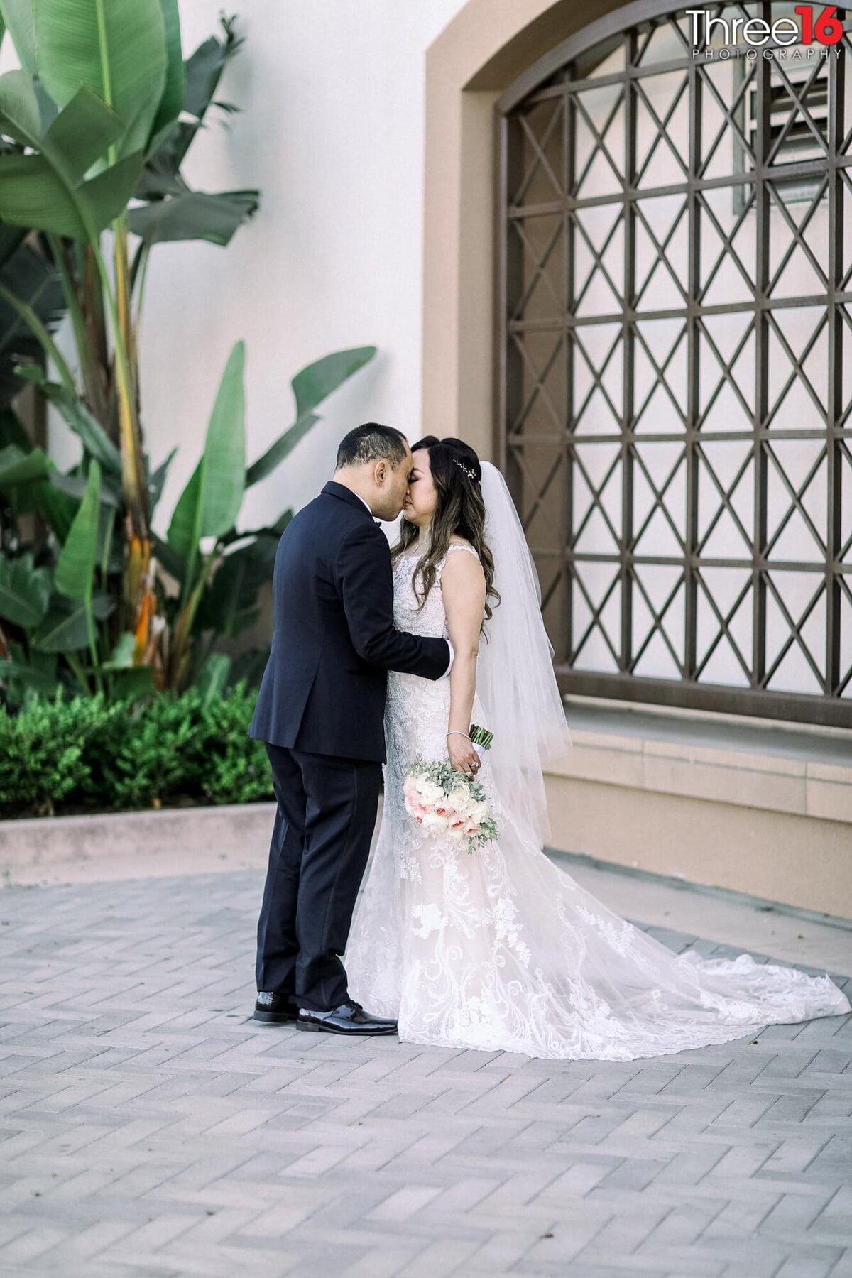 Tender moment for newly married couple as they pray together