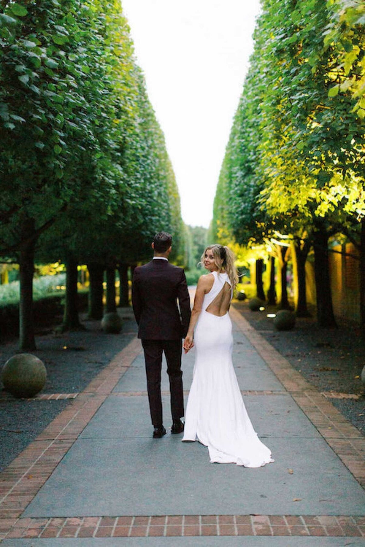 Stunning golden hour newlywed photos at the Chicago Botanic Garden during a luxury Chicago outdoor garden wedding.