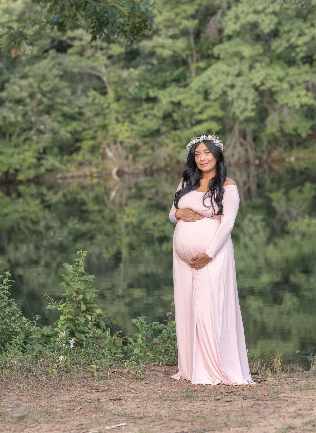 maternity by the lake, wearing pink maternity dress and a flower crown