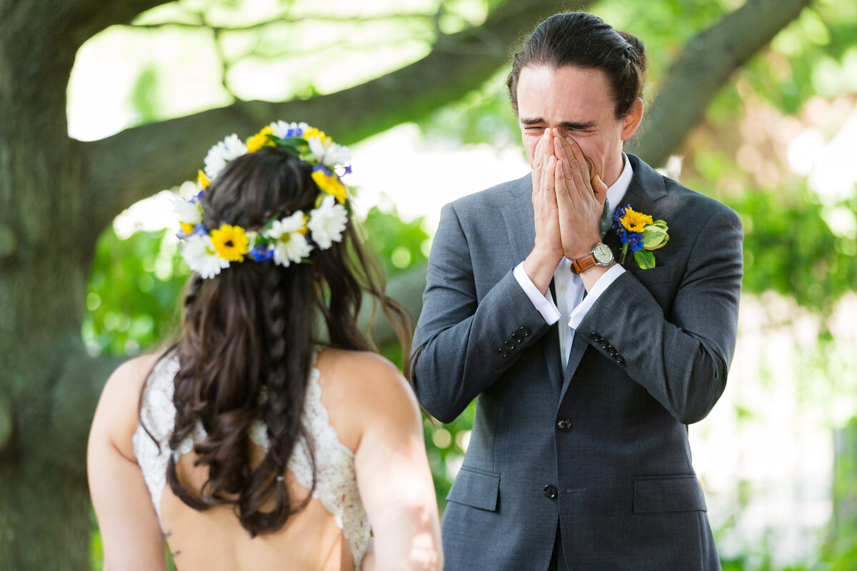 Groom crying during First Look with bride during North Texas wedding photographer