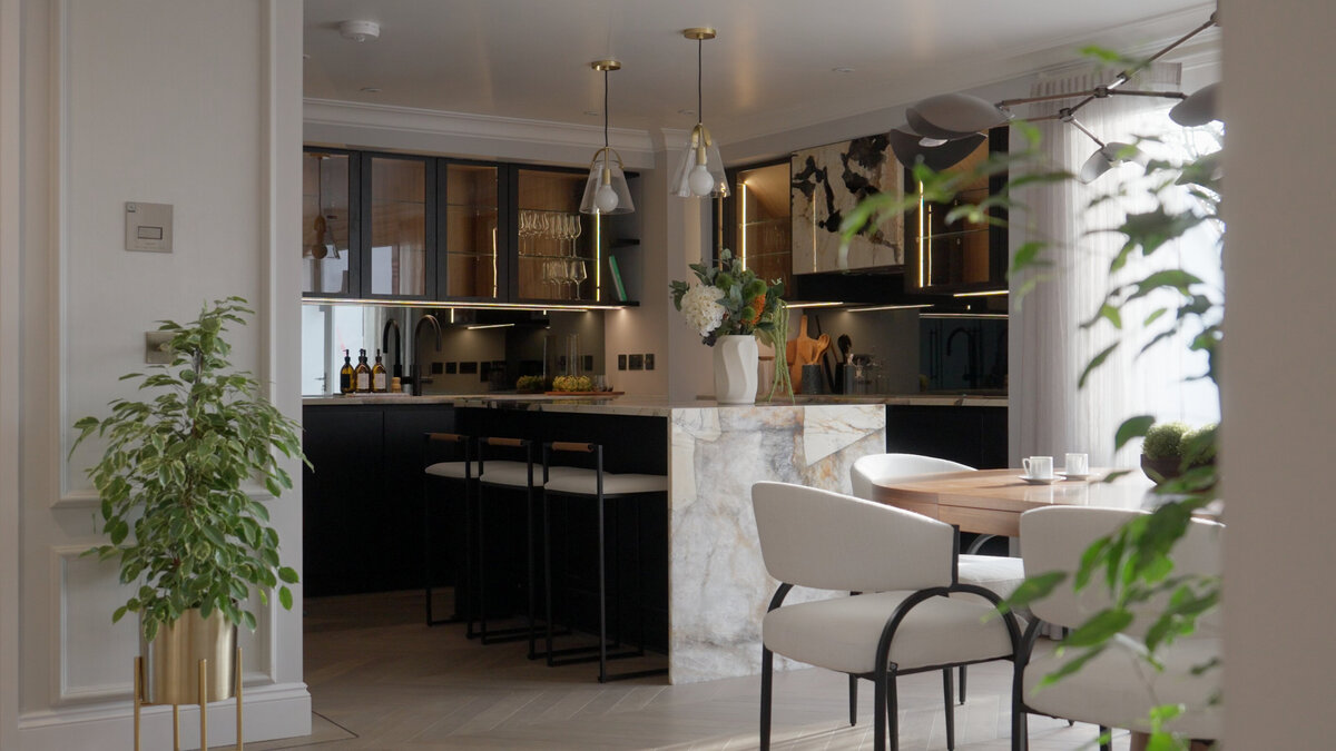 Modern luxury black kitchen with Patagonia stone