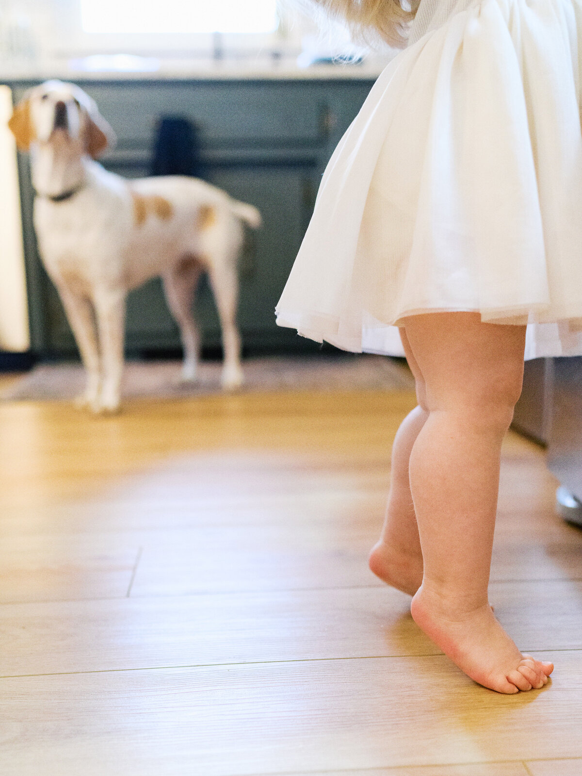 toddler-tippy-toes-in-kitchen