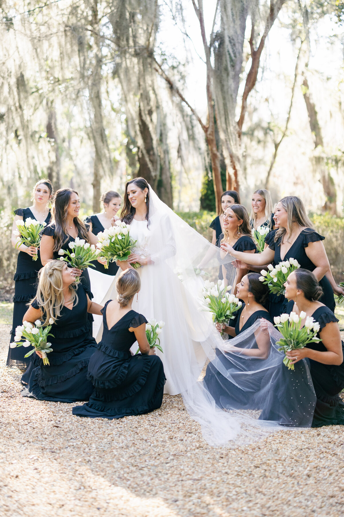a bride surrounded by her bridesmaids