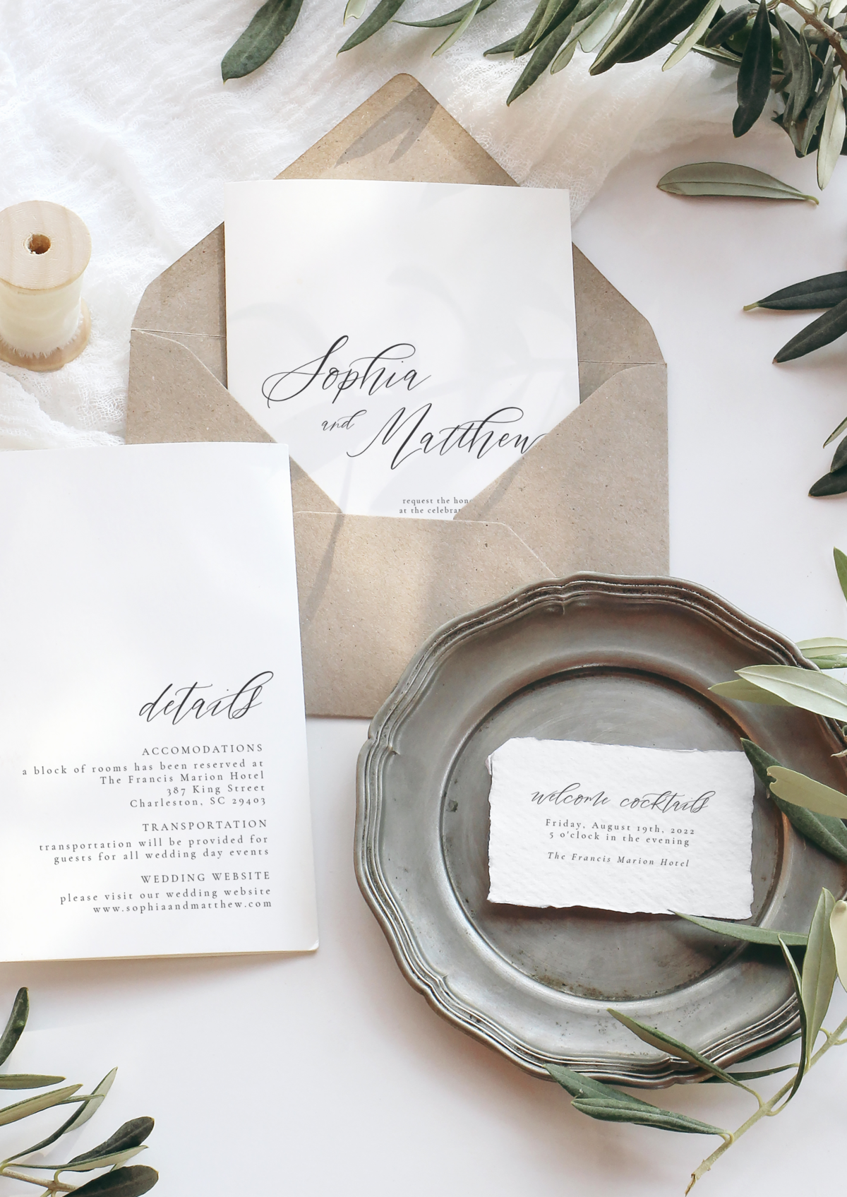 wedding invitation with neutral colors and torn edge paper