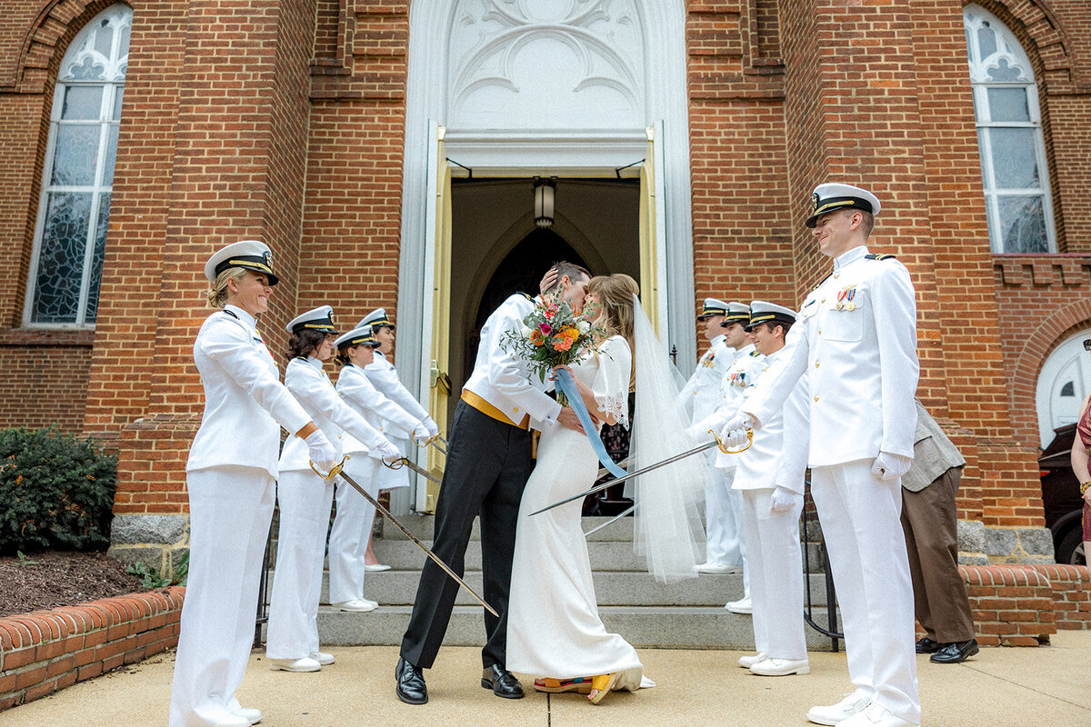 Bride and groom with navy wedding party