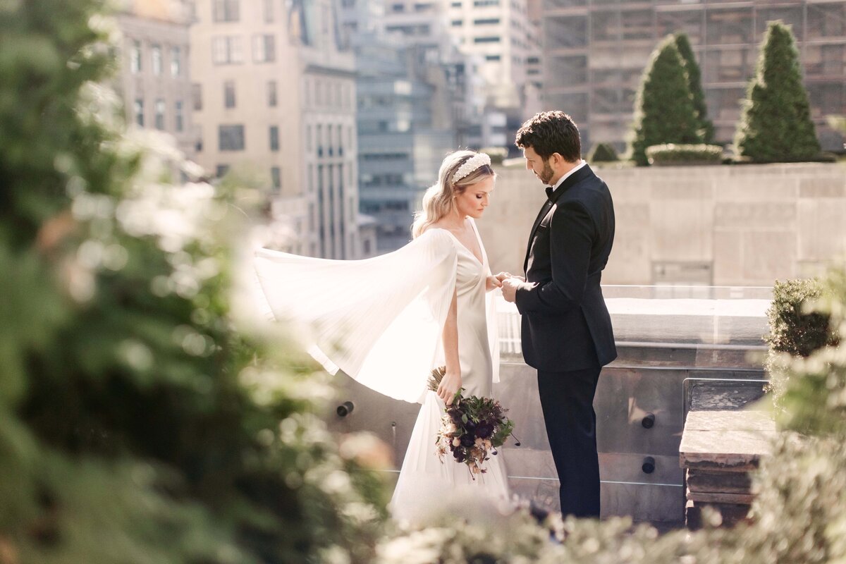 Bride and groom looking at each other in New York City