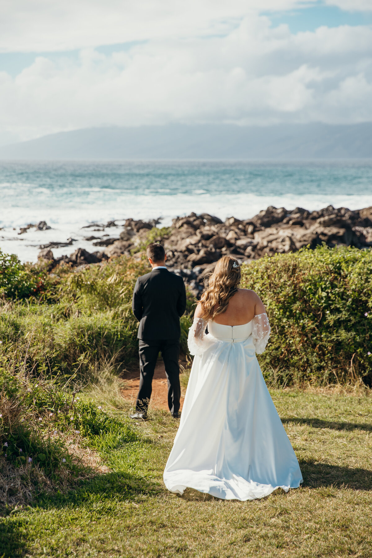 Maui Wedding Photographer captures bride walking up to groom for first look