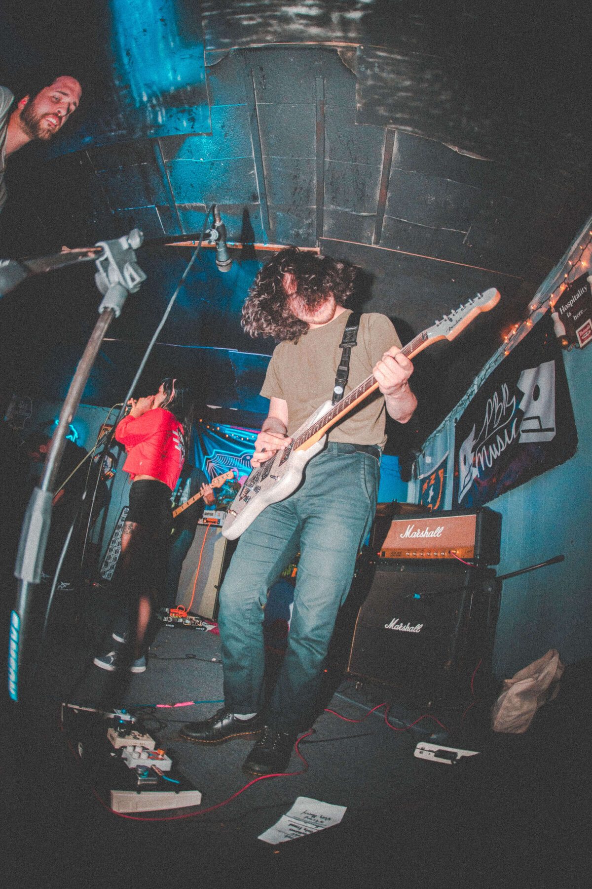 Photography of a guitar player at a small music venue in Charlotte, NC