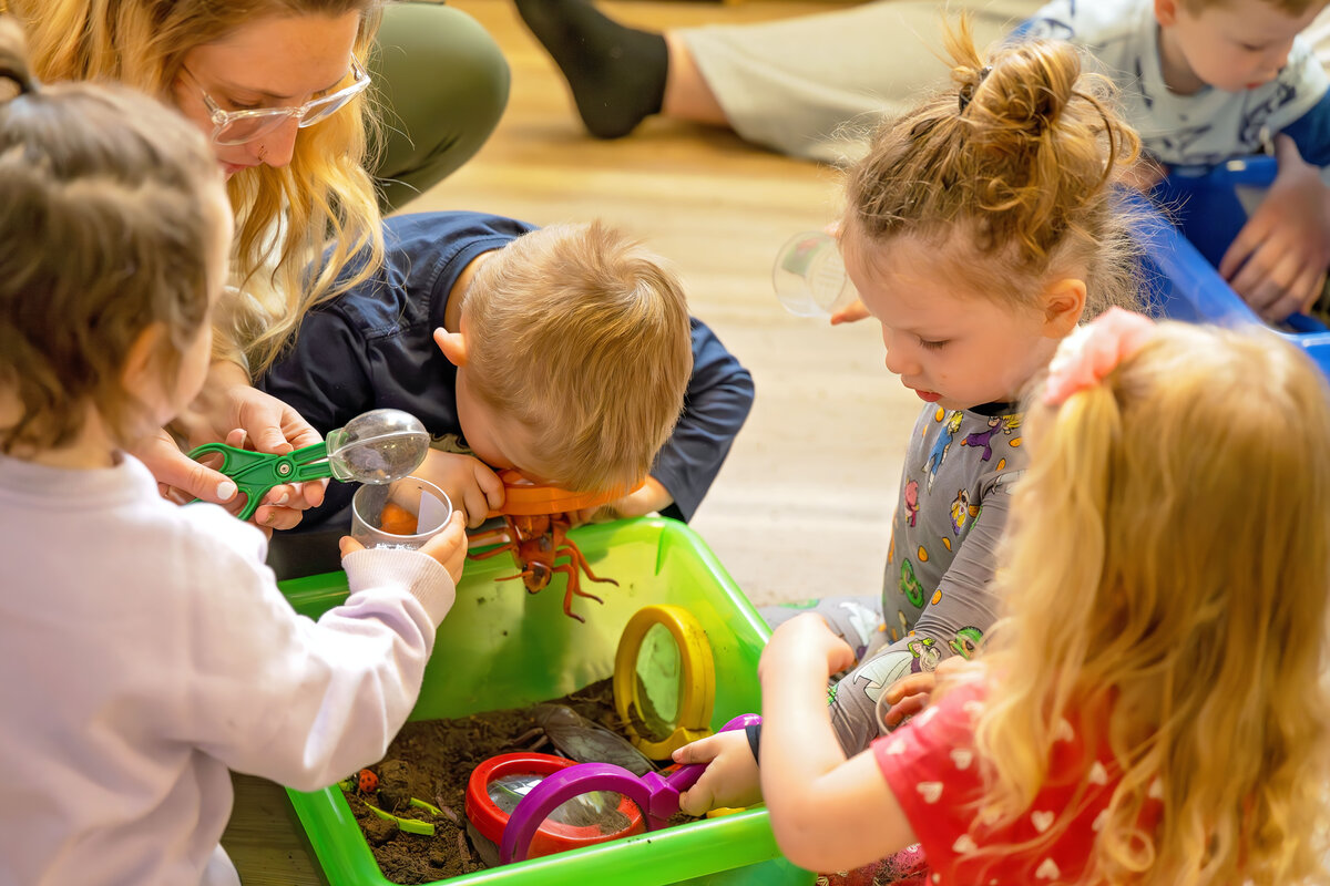 littlebuckschildcare - kids playing with dirt