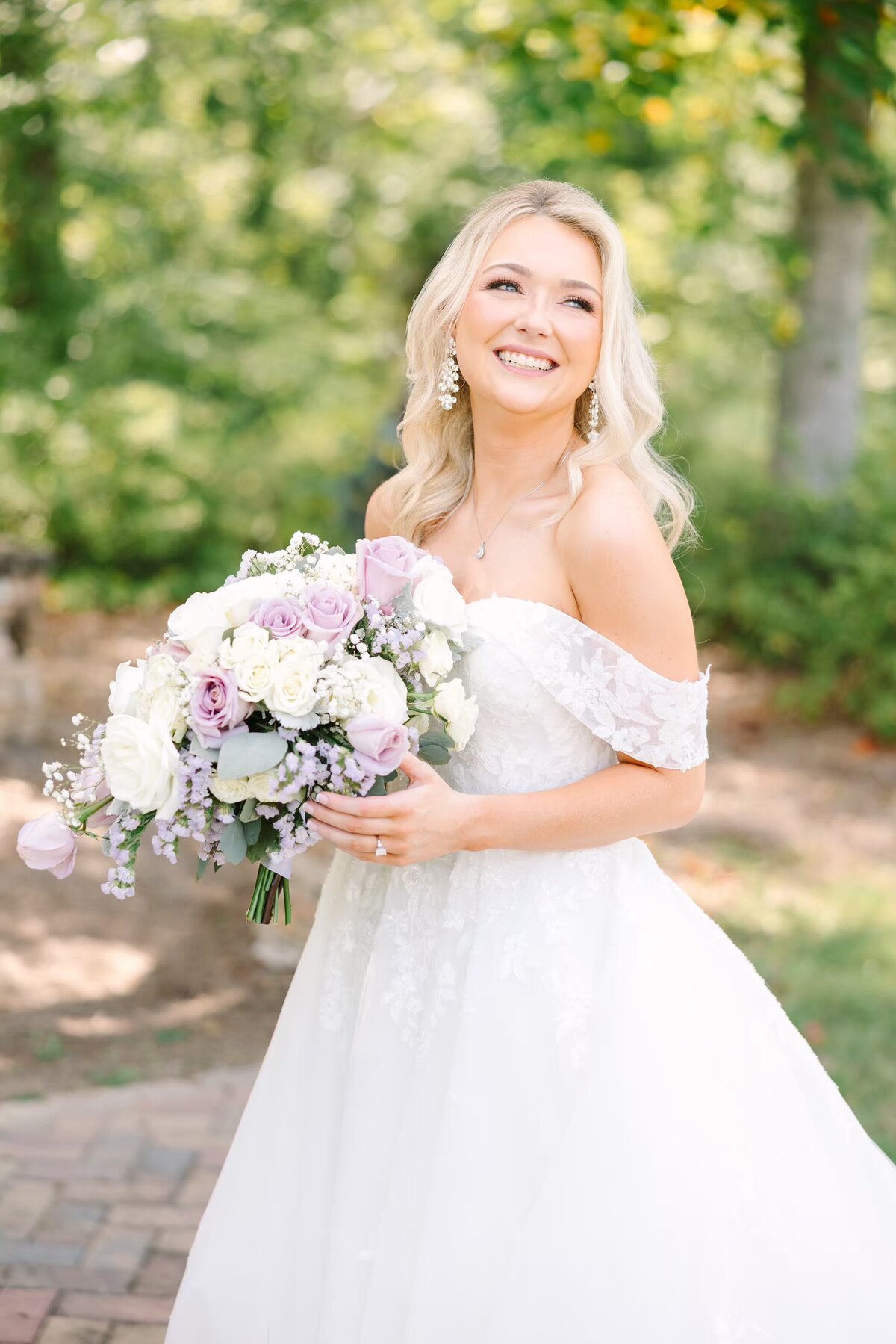 Laughing bride looking over her shoulder
