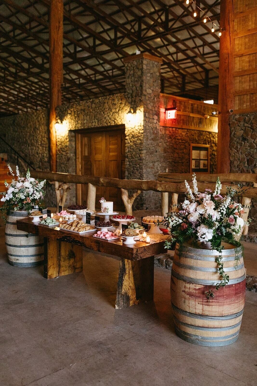 Sweet heart table adorned with flowers by Flowers and Thyme at Maysara Winery.