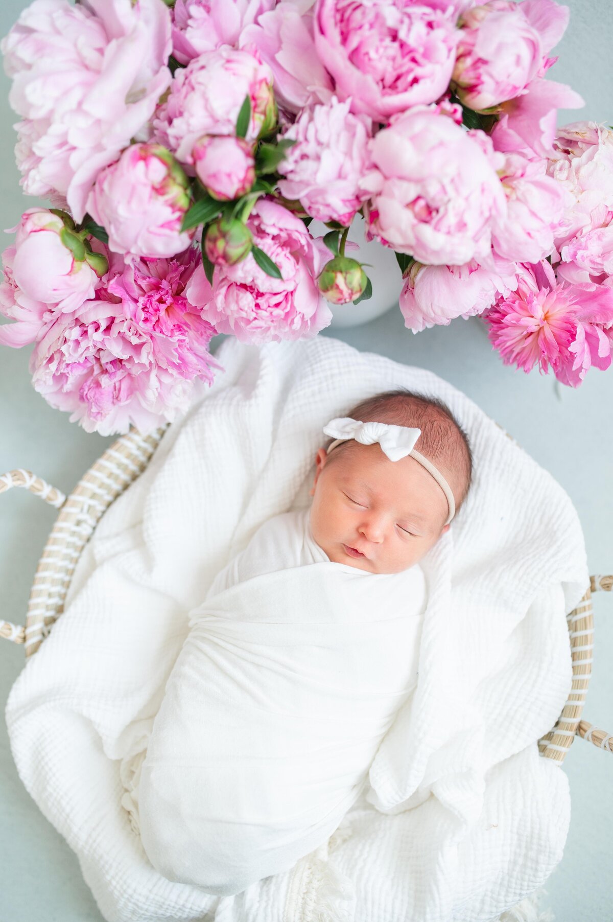 baby-girl-next-to-peonies