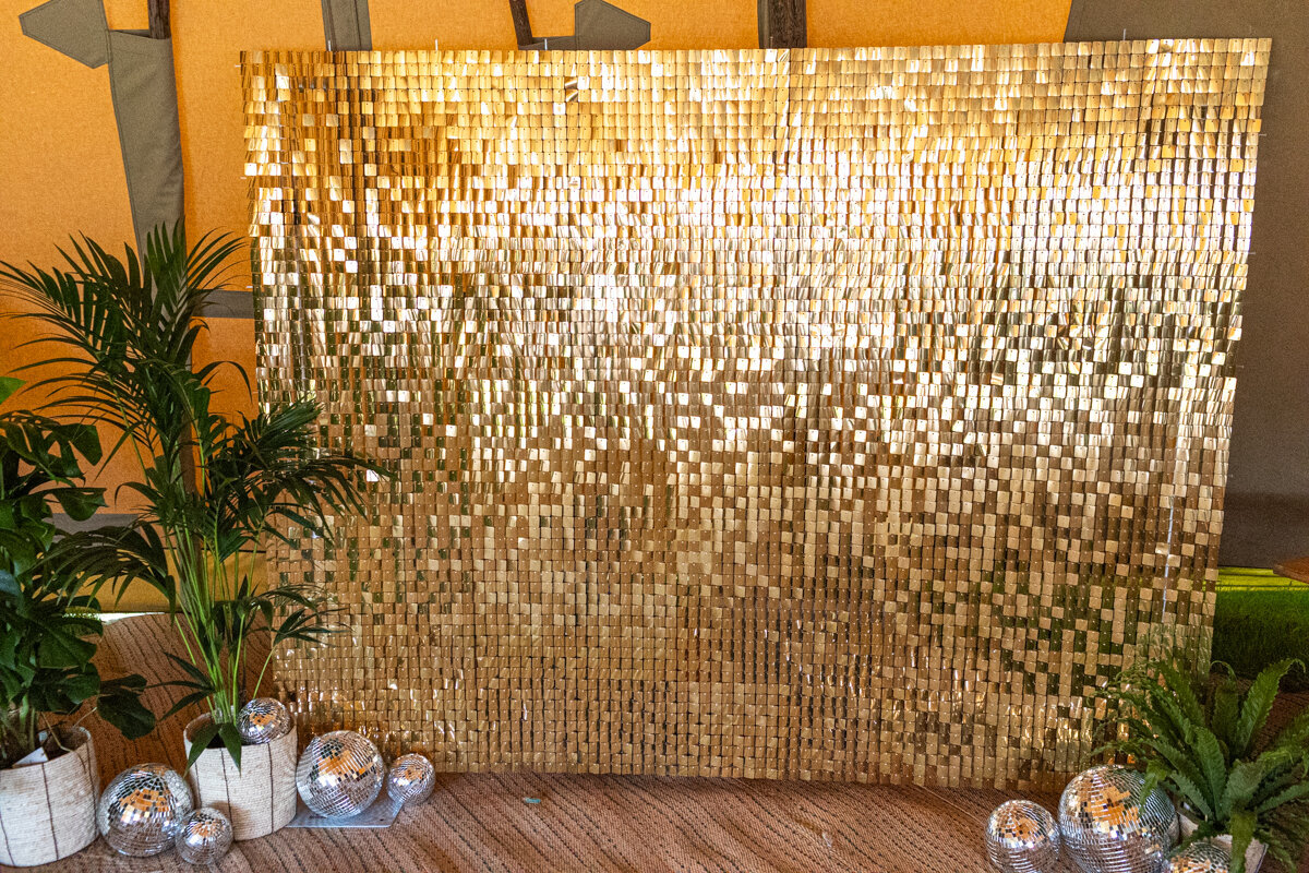 gold shimmer wall backdrop for hire for weddings or corporate events