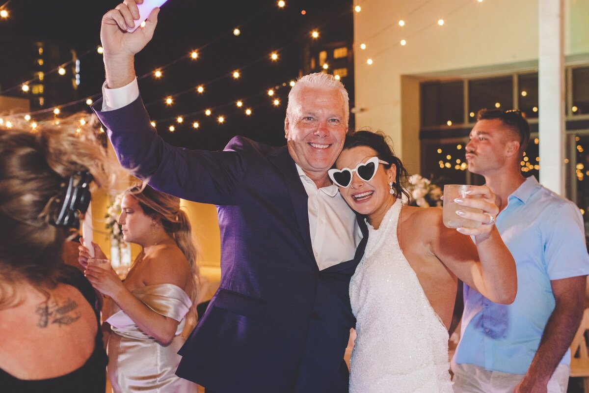 Bride and father on dance floor at wedding in Cancun